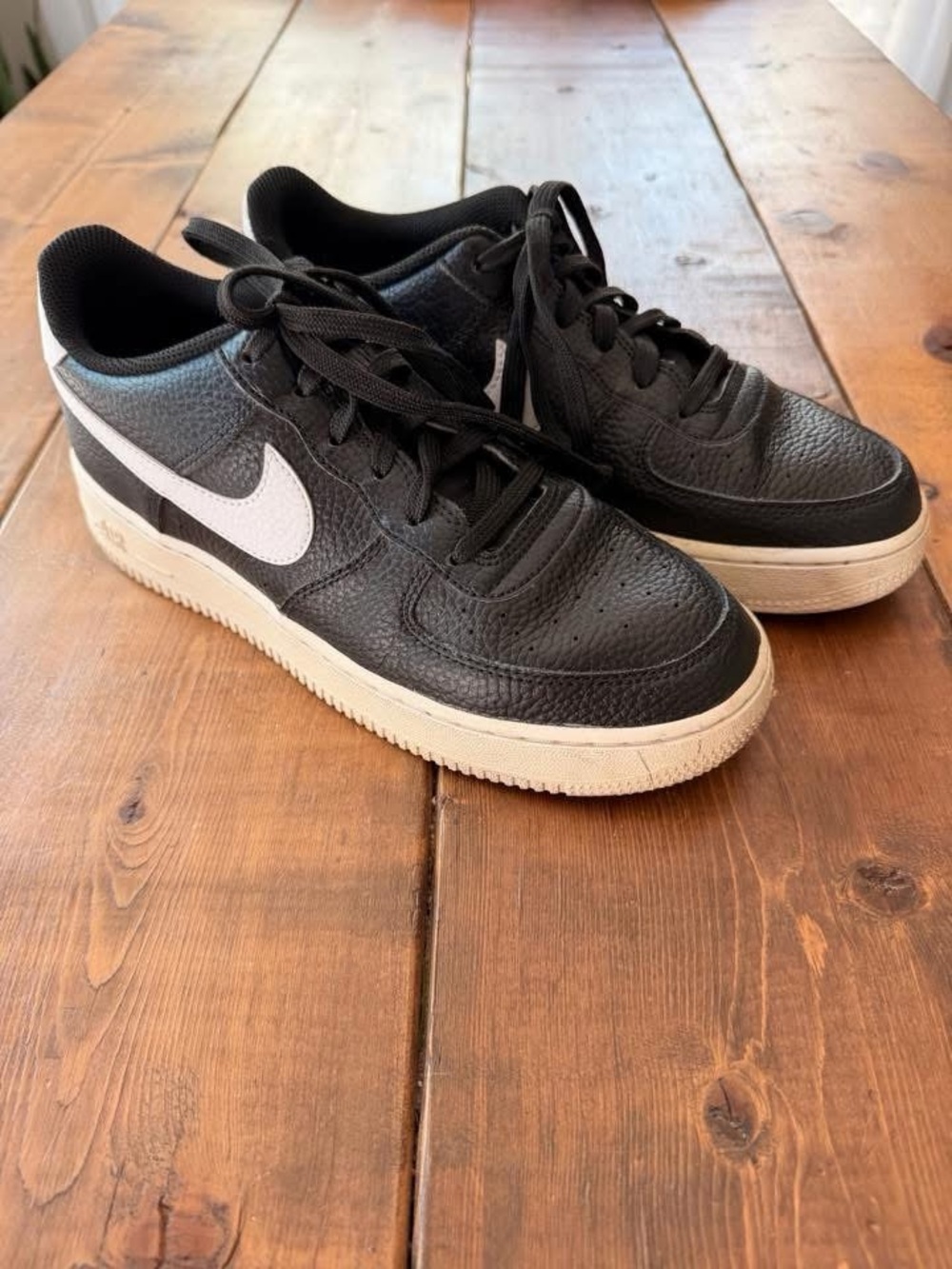 Nike Kids Black Sneakers with White Swoosh